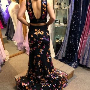 Black 2 piece prom dress with coral, pink and blue appliqués